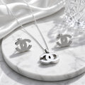 Chanel Σετ Κολιέ και Σκουλαρίκια CC Ασημί